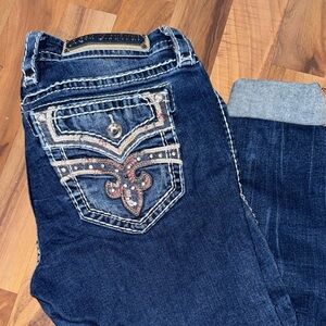 Rock Revival Jeans with Intricate Pocket Design